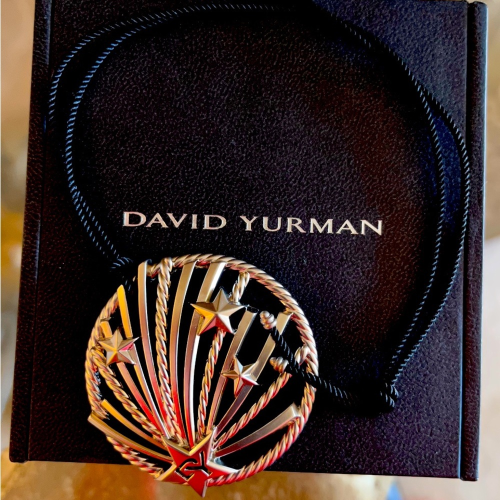 David Yurman piece on black knotted chord marked 2021